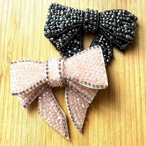 Beaded pink and black bows can perfect for making hair accessory or shoe clips or bow tie