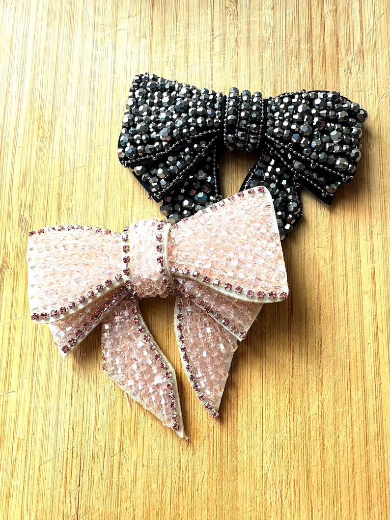 Beaded pink and black bows can perfect for making hair accessory or shoe clips or bow tie