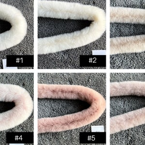 May include: Six different fur collars in various shades of white and pink. The collars are arranged in two rows of three, with each collar labelled with a number from 1 to 6.