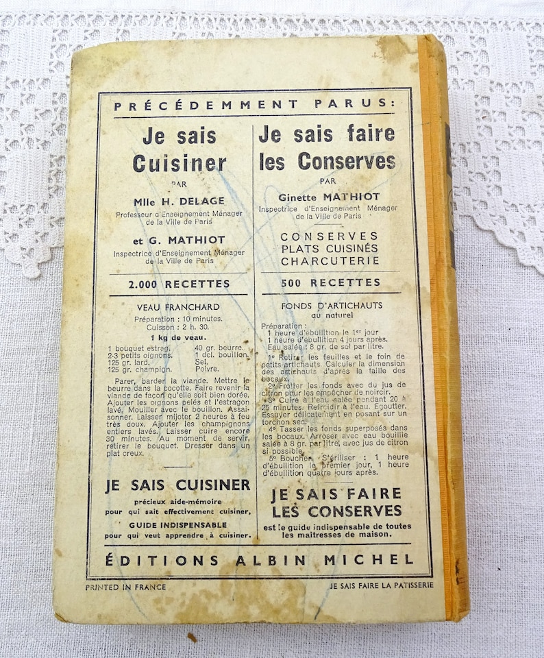 Pode incluir: Uma capa de livro de cozinha vintage com um design amarelo e laranja. O t&iacute;tulo &eacute; "Je sais cuisiner" e "Je sais faire les conserves". O livro &eacute; de Editions Albin Michel.