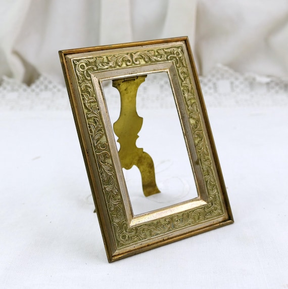 Small Antique French Gilt Metal Picture Frame with Ornate Embossed Floral Border and Hinged Easel Stand, Omalu Metal Portrait Frame France