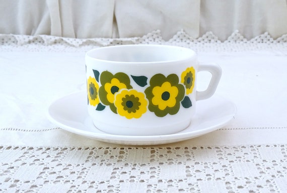 Vintage French Mid Century White Milk Glass Coffee Cup and Saucer by Arcopal with Stylized Yellow and Olive Green Flower Pattern, 1970s Mug