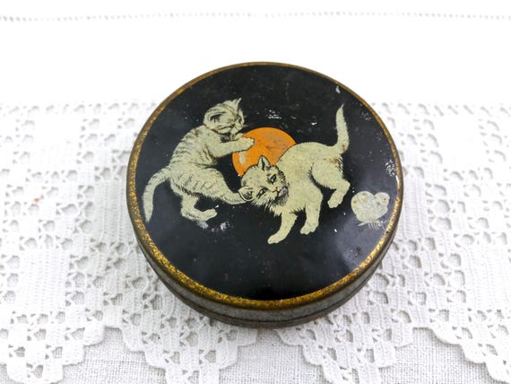 Antique French Lithographed Round Candy Metal Tin from Paris with Kitten Playing in Black and White on the Lid and Graphics of the Factory