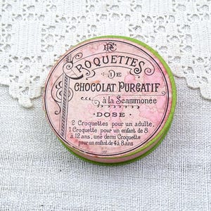 Piccola scatola rotonda francese antica in cartone per crocchette di cioccolato purgante medicinale, vetrina per farmacia retrò