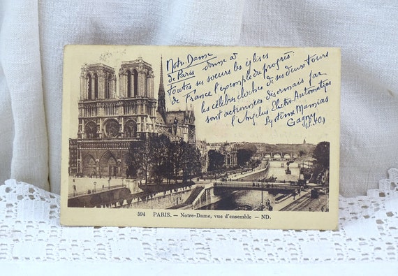 Antique Collectible Black and White French Postcard View of Notre Dame Cathedral in Paris with the River Seine and Barges