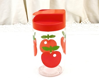 Französischer Vintage 1970er Jahre Henkel Glas Vorratsdose mit rotem Kunststoff Ausgießer und rotem und grünem Apfelmuster, Retro Küchengeschirr aus Frankreich