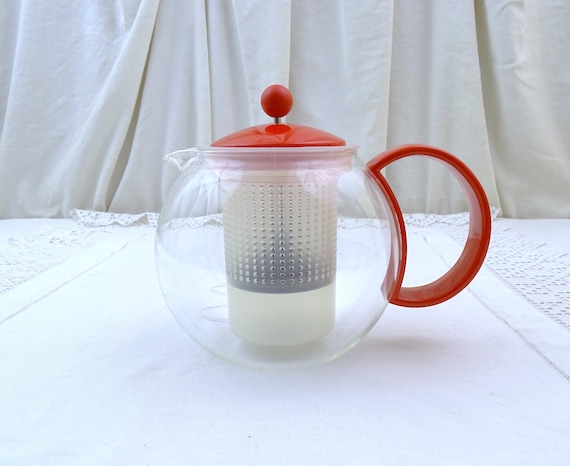 Vintage 1980s Danish Bodium Glass Globe Tea Pot in Clear Glass With Bright Red Melamine Handle, Retro Press Push Infuser for Herbal Teas