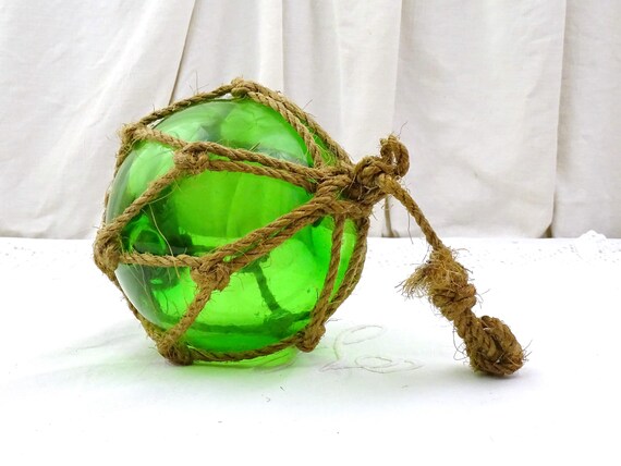 Large Vintage Green Glass Fishing Net Float with Knotted Cord Surround, Retro Fishing Seaside Themed Decor from France, Old Style Marine