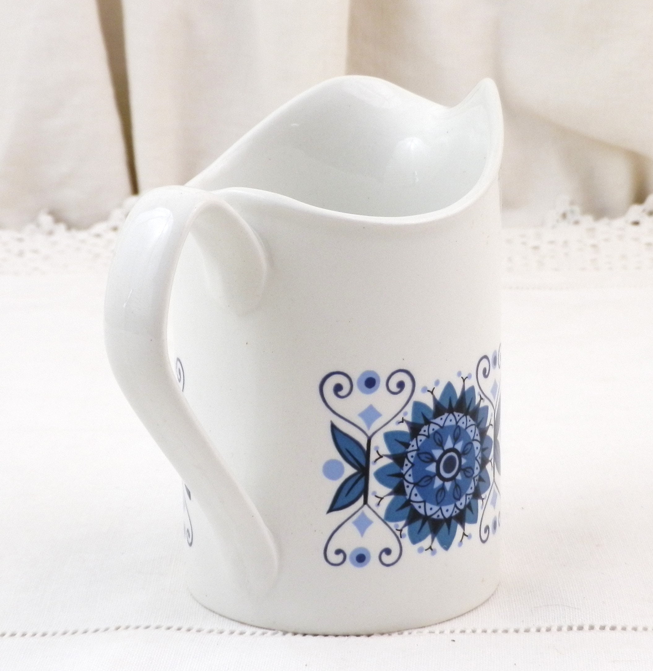 Vintage Small ceramic creamer pitcher with lid. White with Blue Bow on Lid