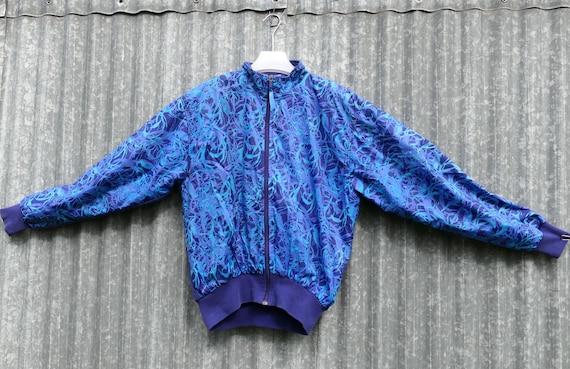 Vintage French Large 1990s Y2K Decathlon Cyclist Jacket in Blue Tones with Back Pocket, Retro 90s Sports Top from France Abstract Graphics