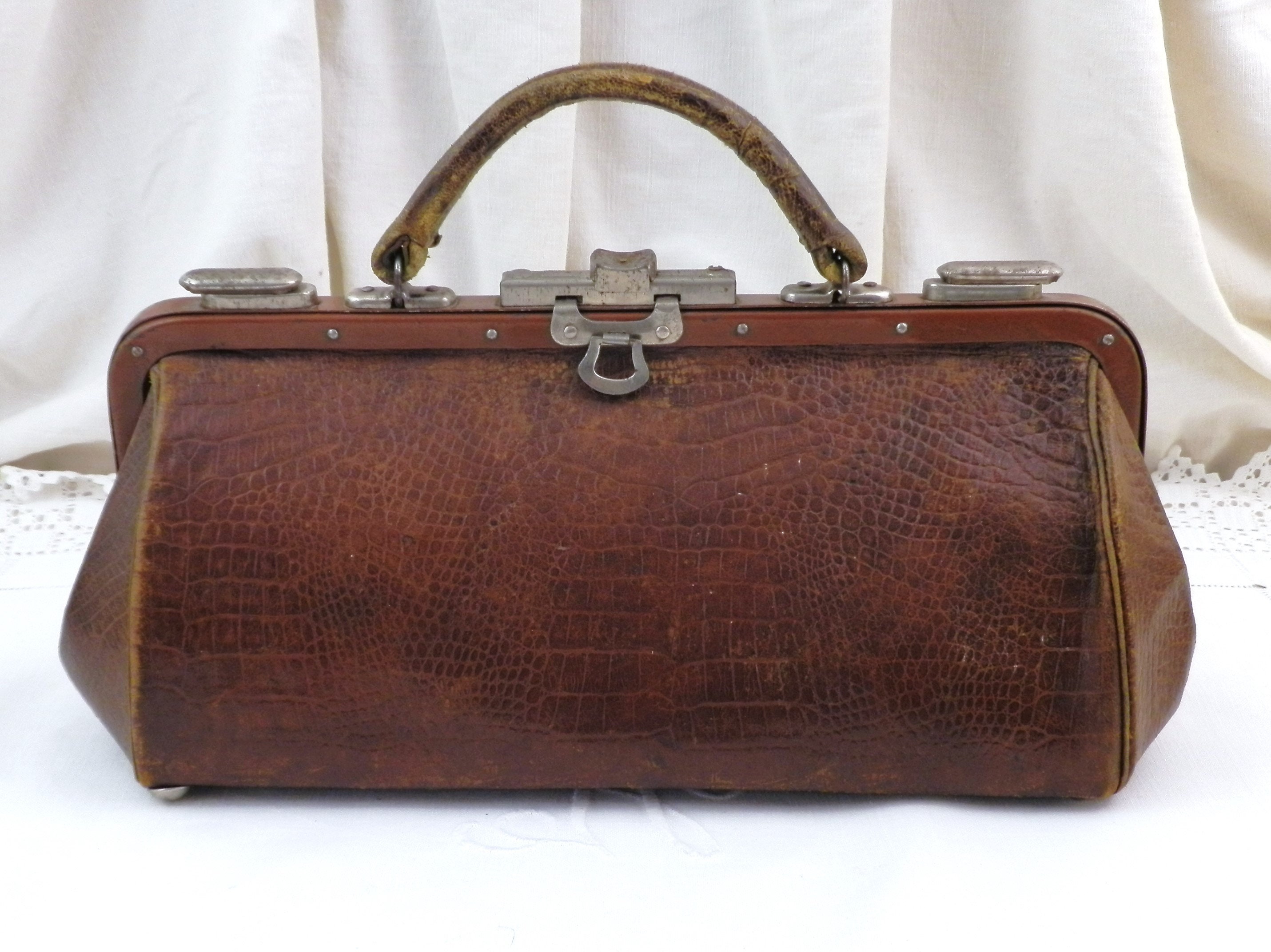 A leather doctor's Gladstone bag by J W Allen, The Strand, London