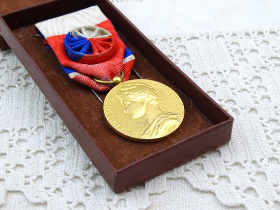 Vintage French 1954 Gold Plated Work Medal with Tricolor Ribbon, Retro Decorative Curio From France, Red White and Blue Style Reward Award