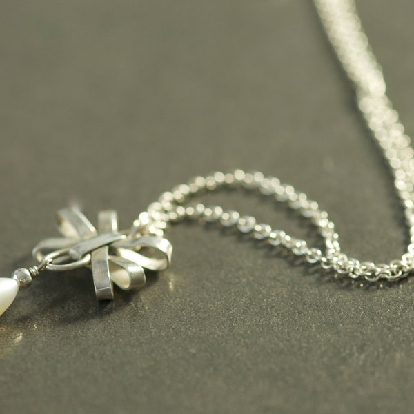 Silver Bow Necklace With Freshwater pearl drop