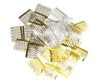 May include: A group of gold and silver hair combs. The combs are arranged in a circular pattern.