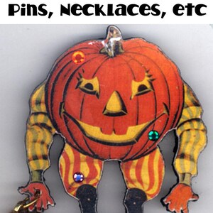 May include: A die-cut pumpkin with a friendly face, wearing striped pants and holding a small pumpkin. The pumpkin is decorated with colorful rhinestones.