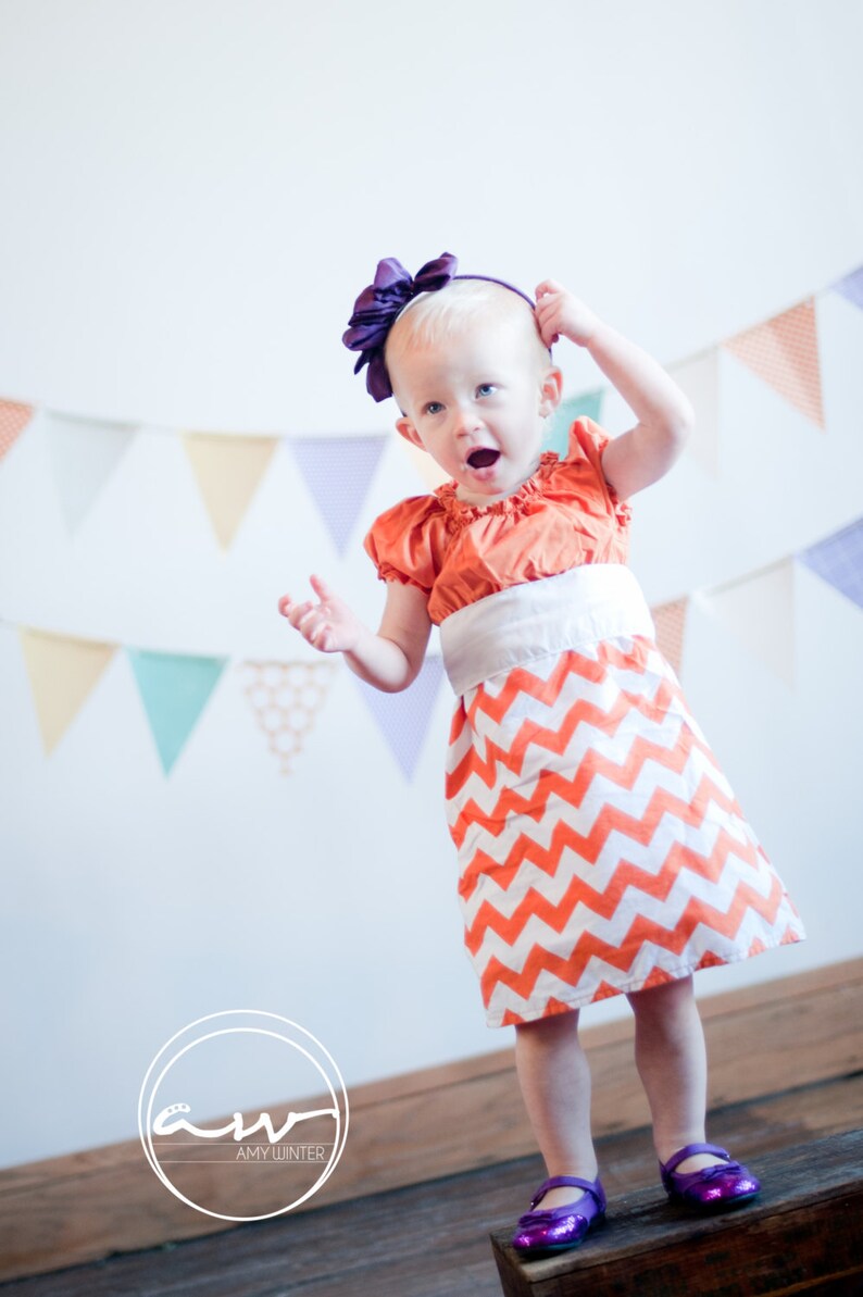 Orange and White Chevron Peasant Dress image 0