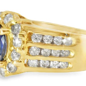 Magnificent Estate 14 kt geelgouden éénkaraats solitaire diamanten ring tanzaniet