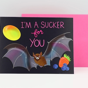 Un ventouse pour vous ! Carte mignonne chauve-souris d'amour avec des fruits