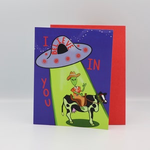 Je crois en vous ! Carte vierge mignonne de cow-boy extraterrestre et de vache de bonne chance
