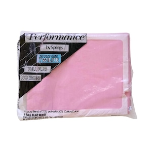 May include: A pink full flat sheet in a plastic package. The package has a black label with the text "Performance by Springs 124 Thread Count Twilite Full Flat No Iron A Luxury Blend of 70% polyester 30% Cotton/Coton 1 Full Flat Sheet For 54 x 76 in. (137 x 193 cm) Mattress".