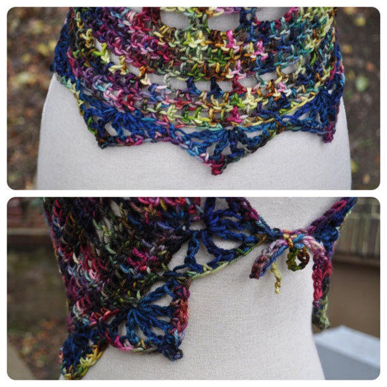 May include: A multi-colored crochet shawl with a scalloped edge. The shawl is made with a variety of shades of blue, green, purple, and brown yarn.