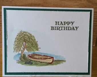 Happy Birthday card, featuring boat near water