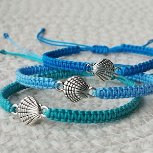 Pulsera macramé Camino de Santiago de concha de vieira