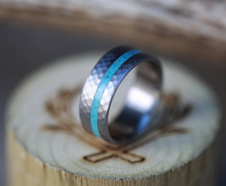The Vertigo Staghead Designs Hammered Titanium Wedding Ring with Offset Turquoise Inlay
