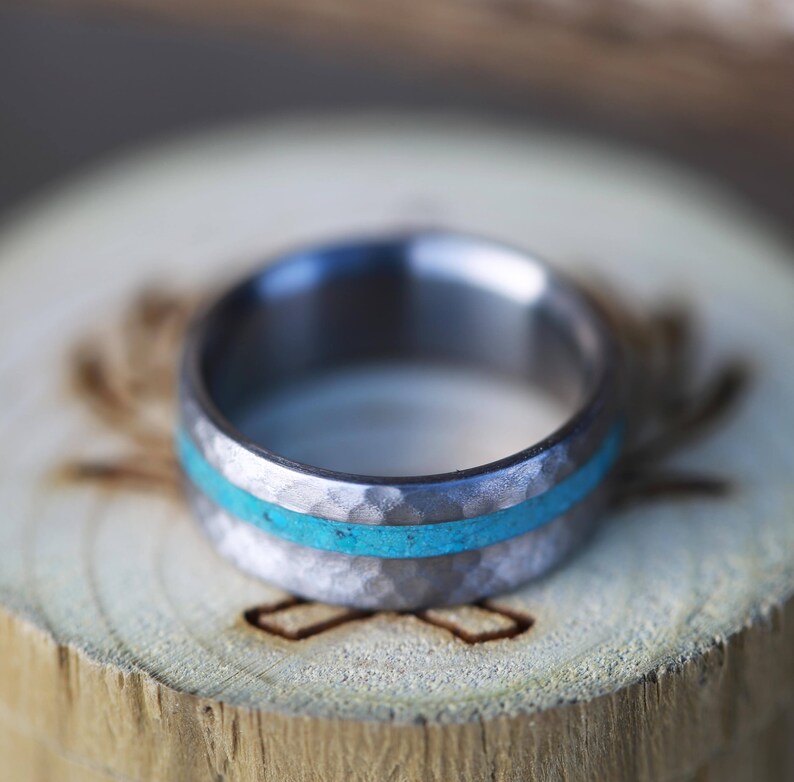 The Vertigo Staghead Designs Hammered Titanium Wedding Ring with Offset Turquoise Inlay