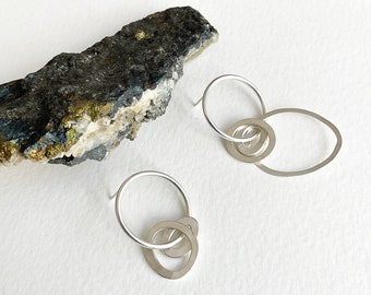 Modern mismatched circle earrings, asymmetrical geometric silver earrings, drop and dangling circle stud earrings