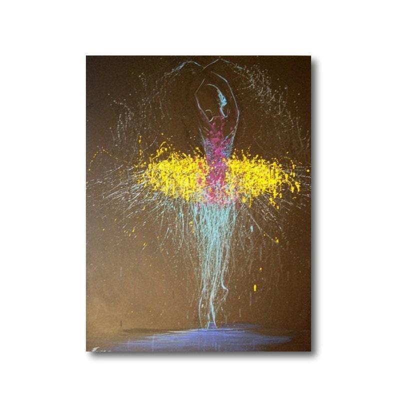 May include: Abstract art print of a ballerina in a dynamic pose. The figure is depicted with splashes of yellow, pink, and blue paint against a dark background. The artwork evokes movement and energy, with a focus on color and form.