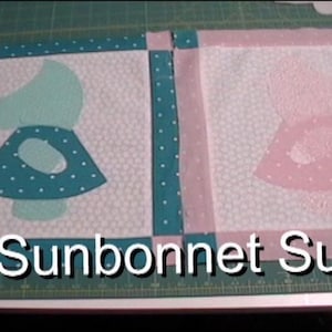 Mailed Sunbonnet Sue pattern with physical templates and guides.