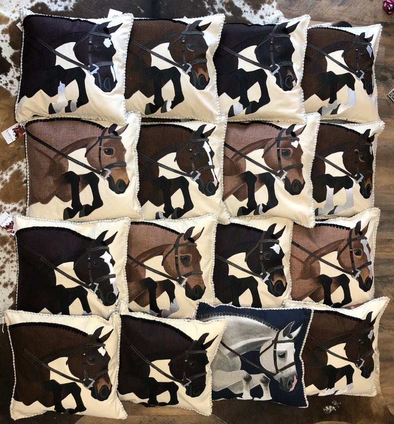 May include: A collection of 15 decorative cushion covers featuring a brown horse jumping over a fence. The cushions are arranged in a grid pattern on a wooden floor. The cushions are made of a soft, beige fabric with a brown horse design. The horse is depicted in a jumping position, with its legs extended and its head turned to the side. The cushions are a great way to add a touch of equestrian style to any room.