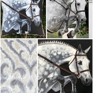 May include: A grey and white horse with a brown bridle jumps over a fence. The horse is in mid-air with its legs extended. The horse is on a black background.