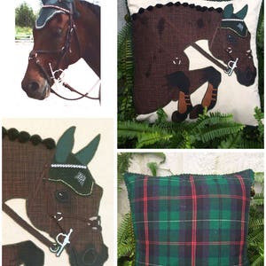 May include: Two decorative throw pillows featuring a brown horse head with a green and white bridle. One pillow has a plaid pattern in green, black, and red. The other pillow has a brown horse head on a white background.