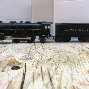 Lionel 0 Gauge locomotive 1110 and Scout Tender Tested and works great.