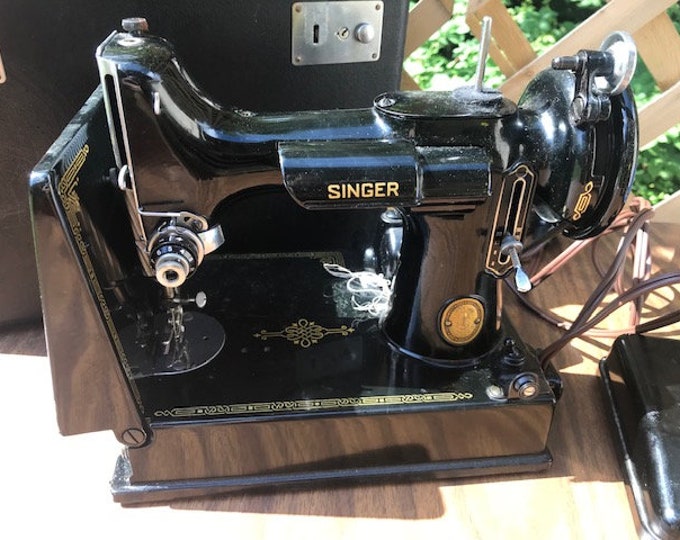 Amazing Singer Sewing Machine 221 Photos