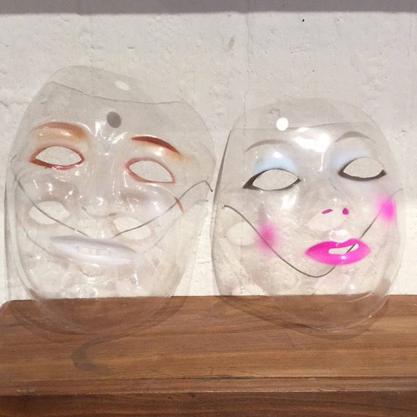 A pair of transparent plastic full face masks (1970s/1980s)