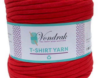 May include: A large, tightly wound ball of vibrant red T-shirt yarn. The yarn is wrapped with a label that reads "Vondrak, You Won't Stop Knitting" and "T-SHIRT YARN". The label also features a teal-colored graphic of a crochet hook and yarn.
