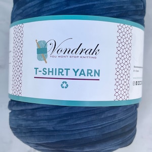 May include: A roll of blue t-shirt yarn, a recycled material, with a label that reads "Vondrak You Won't Stop Knitting T-Shirt Yarn".
