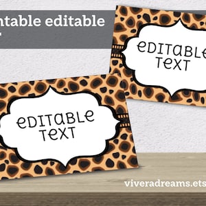 May include: Two printable editable place cards with a leopard print background. The text "Editable Text" is in a white oval on each card.