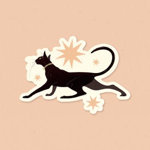 May include: A black cat sticker with a gold collar, leaping across a light peach background. The cat is surrounded by starburst and star graphics in a light peach color. The sticker has a white border.