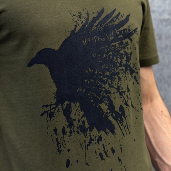 Raven T-shirt in olive green, Earth Positive organic Mens tee, with Irish and Scottish proverb, raven design 'tha fios fithich agad'