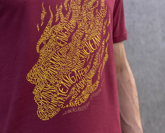burgundy and yellow shirt
