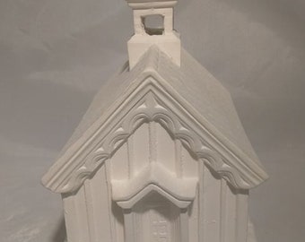 May include: White ceramic church building with a steeple and a door. The church is a blank canvas ready to be painted.
