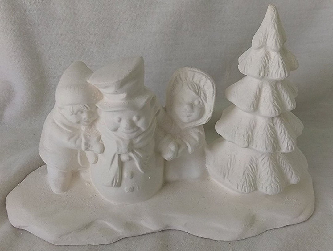 Ready to paint 4 piece Christmas village
