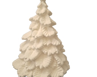 May include: A white ceramic Christmas tree ornament with a detailed, textured design. The tree is a traditional shape with a pointed top and layered branches.
