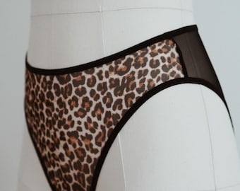 Crotchless black and Leopard print panties. Open crotch panties and See through. Sexy panties with leopard print all sizes and Plus size.