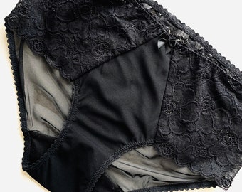 High Style Höschen aus transparentem schwarzem Netzstoff und schwarzer Spitze. Spitze mit Stickerei