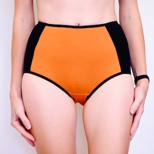 Höschen im Hipster-Style. bequeme Baumwollhöschen. Damenhöschen. Unterwäsche aus Baumwolle. Orange und schwarz. Handgefertigte Sonderanfertigung.